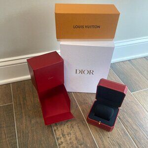Louis Vuitton, Cartier, and Dior take home boxes brand new